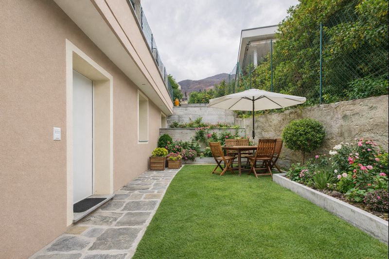 INVESTIMENTO IMMOBILIARE 4%: 3,5 LOCALI A REDDITO IN NUOVA COSTRUZIONE CON GIARDINO E POSTO AUTO