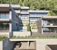 Multi-story apartment building with modern, minimalist design. The building features a garage, balconies, and large windows overlooking a landscaped area with trees and shrubs.