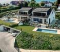 Detached house, two cars in garage, garden with pool, solar panels
