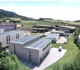 Superbe box-halle artisanale ou commerciale neuve de 100 m2 avec étage complet, au centre de Vaulruz