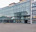 Office building with glass walls, underground parking, front entrance