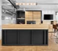 modern office with wooden desk, wooden floor, wooden cabinets, monitor, TV, chairs, table