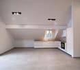 open kitchen, sliding glass door, white cabinets, light fixtures