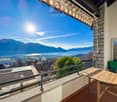 balcony, table, chairs, mountain view