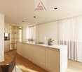 Modern kitchen with marble countertop, integrated sink, a faucet, a white flower vase, wooden floor, and neutral walls