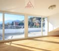 large sliding glass doors, wooden floor, balcony, mountain view