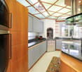 modern kitchen, wooden cabinets, granite countertops, stainless steel appliances, dishwasher, washing machine, island with bar stools, ceiling design, natural light