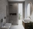 modern bathroom with granite tiles, shower with shower head, bidet, wc, sink with faucet, wooden cabinet, large mirror, plant