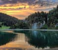 Lake, trees, mountains, cloudy sky, sunset colors
