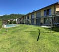 AMPIA BIFAMILIARE 8.5 CON PISCINA E GRANDE TERRENO A MELANO