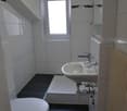 modern white tiles, toilet, shower cubicle, white ceramic sink, white porcelain bathtub