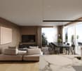 The image shows an open-concept living room and dining room with large windows and a balcony/terrace. The living room features a beige sectional sofa, a wall-mounted TV, and a decorative wall panel. The dining area has a large wooden table with chairs. Th