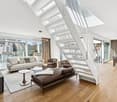 modern design, hardwood floors, large windows, balcony, sofa, coffee table, dining table, chairs, chandelier, lamp