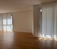 empty room, wooden floor, white walls, white curtains, windows, sunlight