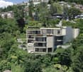 modern style house, several levels, large windows, swimming pool, terrace, green surroundings