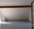Empty room with white walls, wooden beams on the ceiling, and a large window with a metal grate covering it.