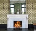 white fireplace, black wall, wooden decor, large mirror