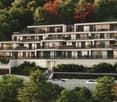 5-story residential building, modern design, large glass windows, terraces, car garages