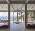 modern interior, large windows, dining table, chairs, round table, sofa, lamp, round hole in floor