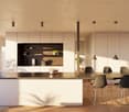 modern kitchen with large island, white cabinets, wooden floors, pendant lights, dining table with chairs