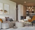 Cozy living room with a gray sectional sofa, yellow accent chair, wooden ceiling, and abstract artwork on the walls. The room also features a modern chandelier and a small side table with a decorative item on it.
