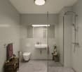 modern bathroom with a shower, a toilet, a sink, a mirror, and a wooden side table with flowers.