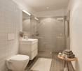 Modern bathroom with white tiles, white toilet, white sink, glass shower enclosure, towel rack, and a small table with towels and toiletries.