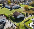 large neighborhood, different sized houses, car parking lot