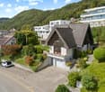 Detached house, concrete driveway, mountain view, garage, car park