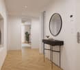wooden floor, white walls, mirror, console table, coat rack, potted plant, white door