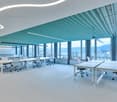 modern office, white tables, glass windows, tebualr ceiling, lake view