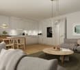 The living room has a large sofa, a wooden coffee table, a small side table, a rug, wooden chairs, and a dining table. The kitchen area has cabinets, a wooden countertop, a potted plant, a sink, a stove, and a refrigerator. The wall has a poster, a pictur