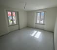 empty room, white tiles, two windows, white walls, ceiling light