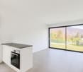 modern kitchen, oven, dishwasher, large glass windows, tiled floor
