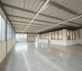 large open space, concrete floor, metal beams, large windows, white walls