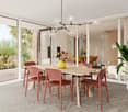 Dining table with 6 chairs, glass doors, balcony, plants, chandelier, yellow vase with flowers