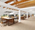 Office with wooden desk, wooden ceiling, computer monitors, ceiling lamps, office chairs