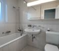 Bathtub, sink, toilet, shower, mirror, wall-mounted cabinet