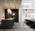industrial kitchen with black countertops, open shelves, large dining table, pendant lights