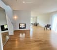empty room, wooden floors, fireplace, dining area