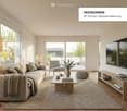 large windows, glass sliding door to balcony, white walls, beige couch, coffee table, armchair, TV, shelves, floor lamp, area rug