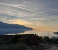 Sunset over the mountains with lake view