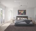 Modern bedroom with wooden floors, white walls, gray bed, beige carpet, bedside tables with lamps, large painting on the wall, glass door leading to a balcony