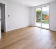 empty room, hardwood floor, sliding glass doors, balcony