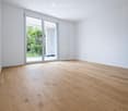 empty room, hardwood floor, white walls, sliding glass door, balcony