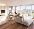 modern living room with large windows, wooden floor, white couch, dining table, kitchen with modern appliances