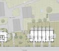 Floor Plan. Floor plan of a residential complex with multiple buildings, parking areas, and landscaped spaces.
