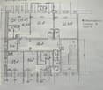 Floor Plan. Floor plan of a 4-room apartment with labeled areas including a balcony, living room, bedrooms, and bathrooms.