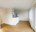 open layout, kitchen, white walls, wooden floor, open kitchen, balcony, washing machine in the kitchen