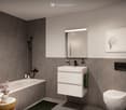 Bathroom with bathtub, sink, toilet, mirror, and picture frame